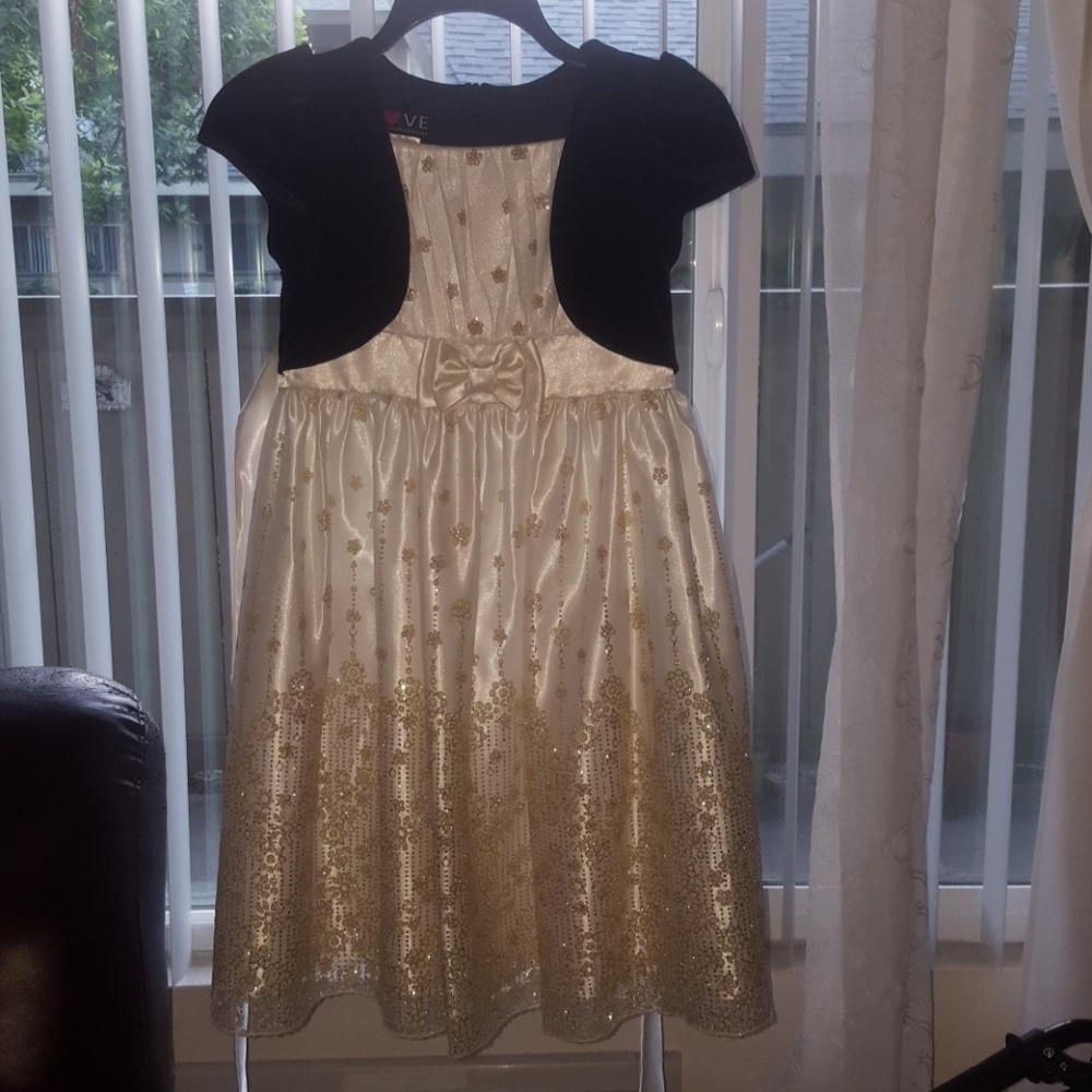 A beautiful dress with a black mine jacket